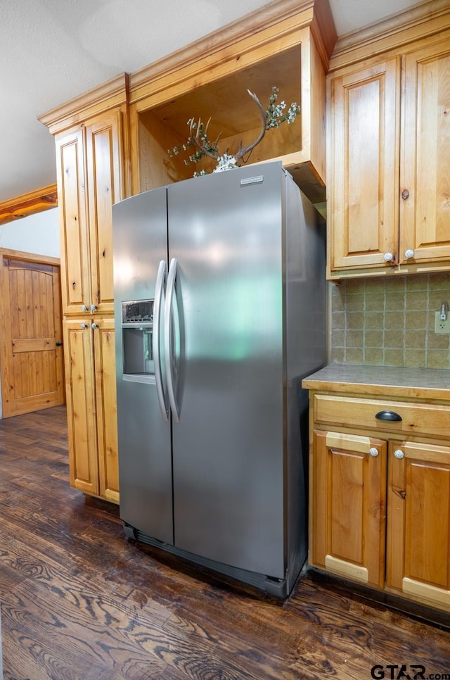 5646 Fm 346, Tyler, TX 75703 - kitchen with tasteful backsplash, dark wood-type flooring, light countertops, and stainless steel fridge
