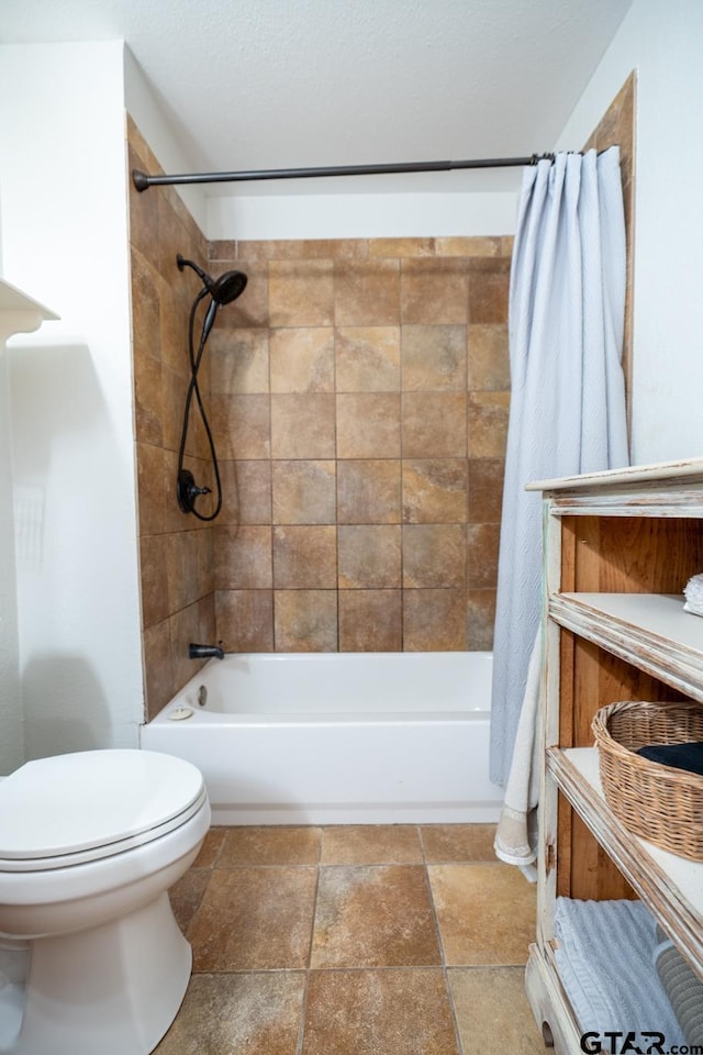 5646 Fm 346, Tyler, TX 75703 - full bathroom with toilet, stone tile floors, and shower / bath combo with shower curtain