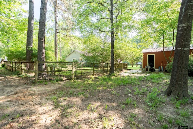 5646 Fm 346, Tyler, TX 75703 - view of yard featuring an outdoor structure and fence