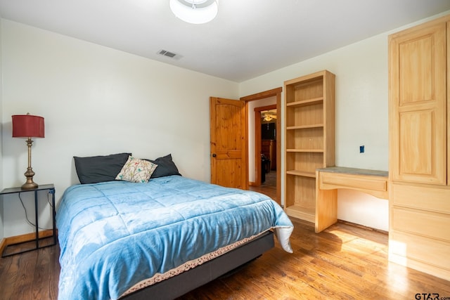 5646 Fm 346, Tyler, TX 75703 - bedroom with wood finished floors and visible vents
