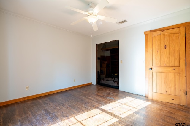 5646 Fm 346, Tyler, TX 75703 - unfurnished room with crown molding, visible vents, ceiling fan, and wood finished floors