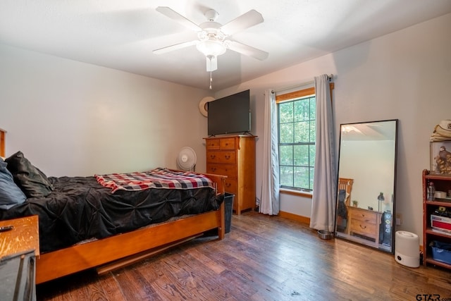 5646 Fm 346, Tyler, TX 75703 - bedroom featuring wood finished floors, ceiling fan, and baseboards