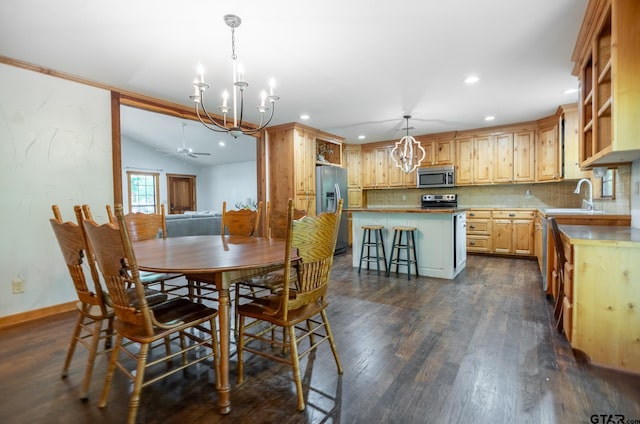 5646 Fm 346, Tyler, TX 75703 - dining space with ceiling fan with notable chandelier, baseboards, dark wood-style floors, and recessed lighting