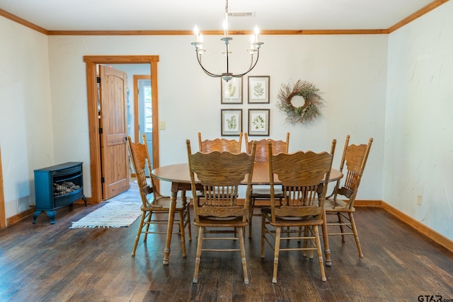 5646 Fm 346, Tyler, TX 75703 - dining area featuring a wood stove, visible vents, crown molding, and wood finished floors