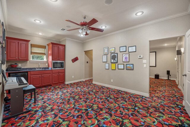 5875 Stonegate Trl, Tyler, TX 75703 - kitchen featuring black microwave, ceiling fan, carpet floors, dark countertops, and crown molding