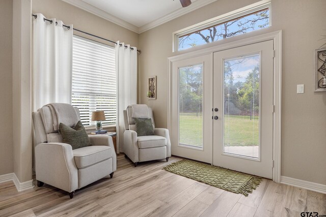 5875 Stonegate Trl, Tyler, TX 75703 - doorway to outside with french doors, light wood-style flooring, ornamental molding, a ceiling fan, and baseboards