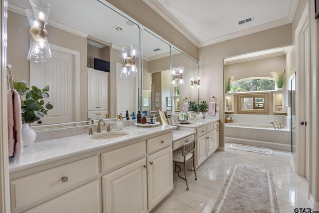 5875 Stonegate Trl, Tyler, TX 75703 - full bath with marble tiled floors, vanity, a garden tub, and ornamental molding