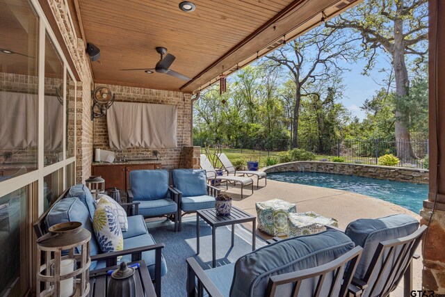 5875 Stonegate Trl, Tyler, TX 75703 - view of patio / terrace with an outdoor living space, a fenced backyard, and ceiling fan