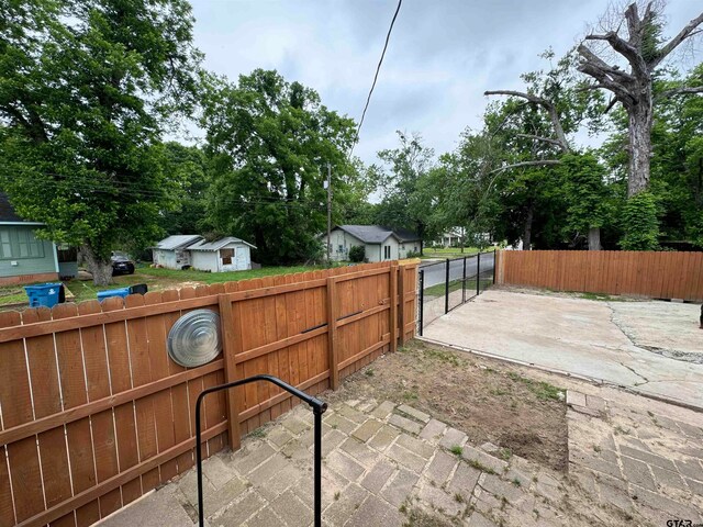 view of patio / terrace with an outdoor structure