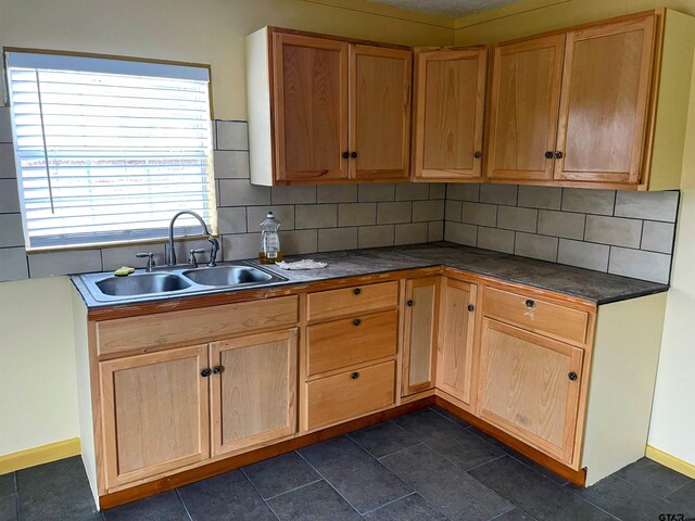 11011 Fm 2767, Tyler, TX 75708 - kitchen featuring sink and decorative backsplash