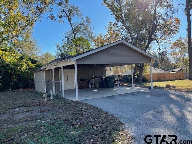 view of car parking with a carport