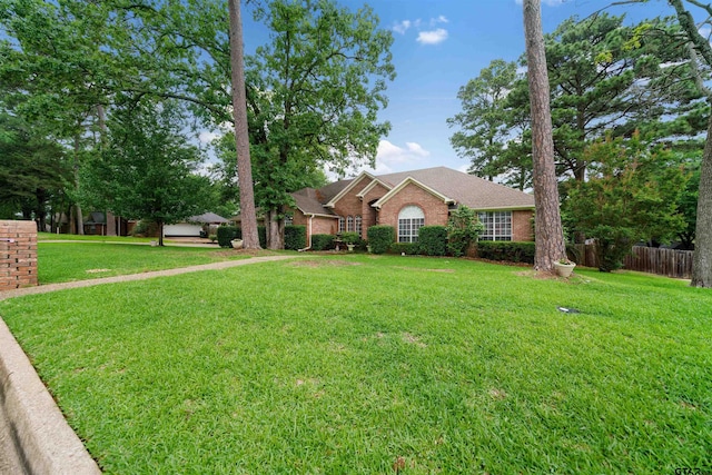 1408 Santa Fe Trl, Tyler, TX 75703 - ranch-style home featuring brick siding and a shingled roof