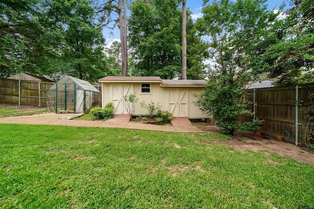 1408 Santa Fe Trl, Tyler, TX 75703 - view of yard with an exterior structure and an outbuilding