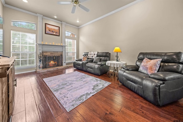 1408 Santa Fe Trl, Tyler, TX 75703 - living area featuring ornamental molding, ceiling fan, a lit fireplace, dark wood-style flooring, and recessed lighting