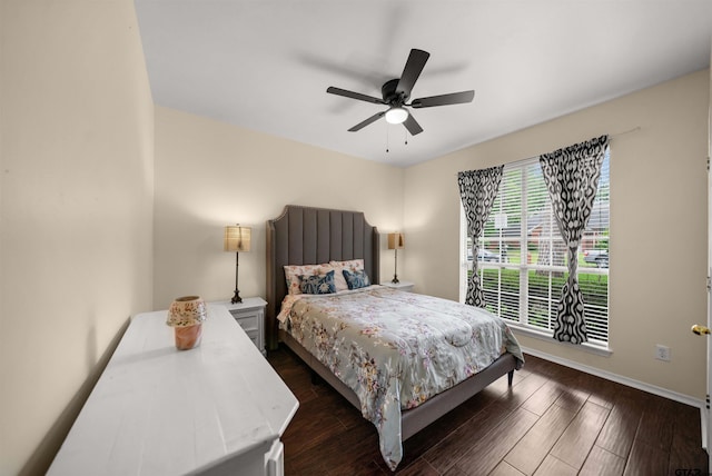1408 Santa Fe Trl, Tyler, TX 75703 - bedroom featuring dark wood-style floors, baseboards, and a ceiling fan