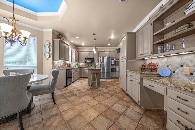 1408 Santa Fe Trl, Tyler, TX 75703 - kitchen with black appliances, a chandelier, backsplash, light stone finish floors, and light stone countertops