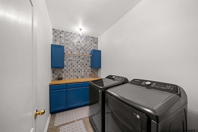 1408 Santa Fe Trl, Tyler, TX 75703 - laundry room with washing machine and dryer and cabinet space