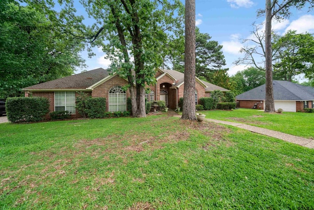 1408 Santa Fe Trl, Tyler, TX 75703 - view of front of property with a front lawn and brick siding