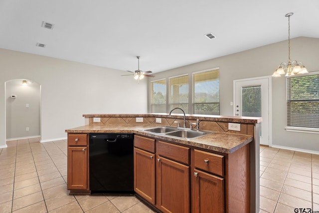 kitchen featuring light tile patterned floors, a kitchen island with sink, dishwasher, ceiling fan with notable chandelier, and sink