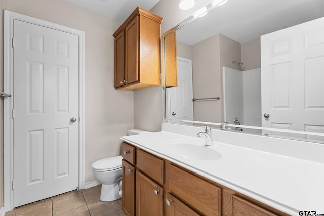 bathroom with a shower, tile patterned floors, toilet, and vanity