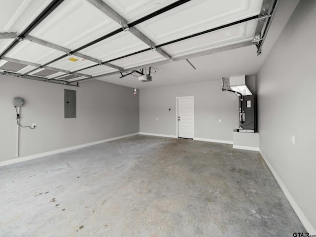 garage with electric panel, a garage door opener, and heating unit