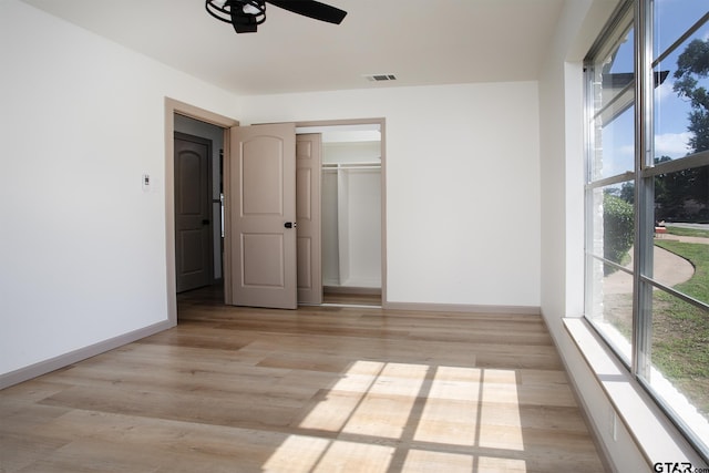 914 Neches Dr, Tyler, TX 75702 - unfurnished bedroom featuring light wood-style flooring, a closet, and ceiling fan
