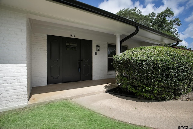 914 Neches Dr, Tyler, TX 75702 - property entrance with brick siding and covered porch