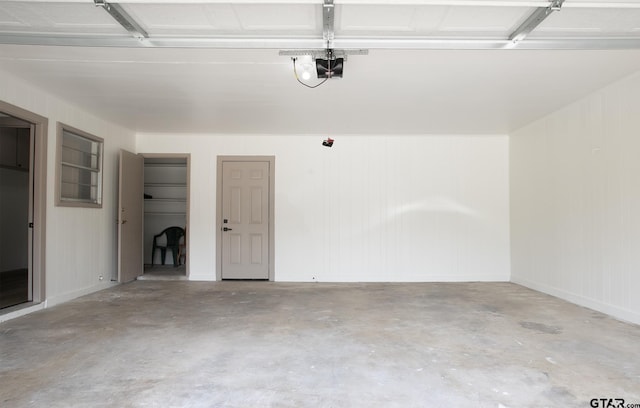 914 Neches Dr, Tyler, TX 75702 - garage featuring a garage door opener