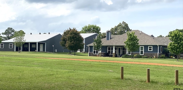 view of front of home with a front lawn