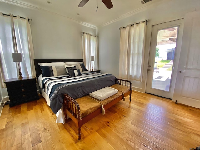 bedroom with ceiling fan, light hardwood / wood-style floors, access to exterior, and crown molding