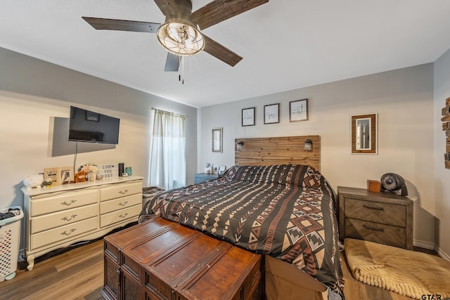 169 Phil Dr, Hawkins, TX 75765 - bedroom featuring ceiling fan and wood-type flooring