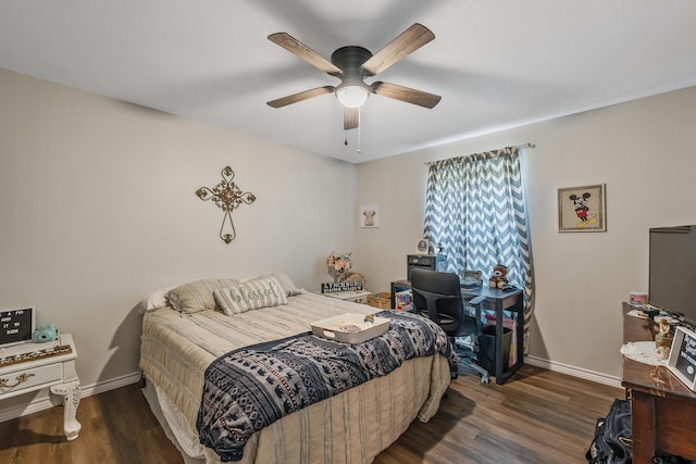 169 Phil Dr, Hawkins, TX 75765 - bedroom with dark wood-type flooring and ceiling fan