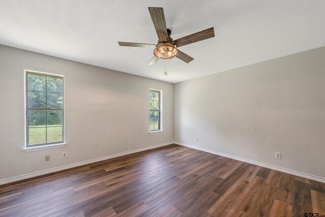 169 Phil Dr, Hawkins, TX 75765 - empty room featuring dark wood-style flooring and ceiling fan