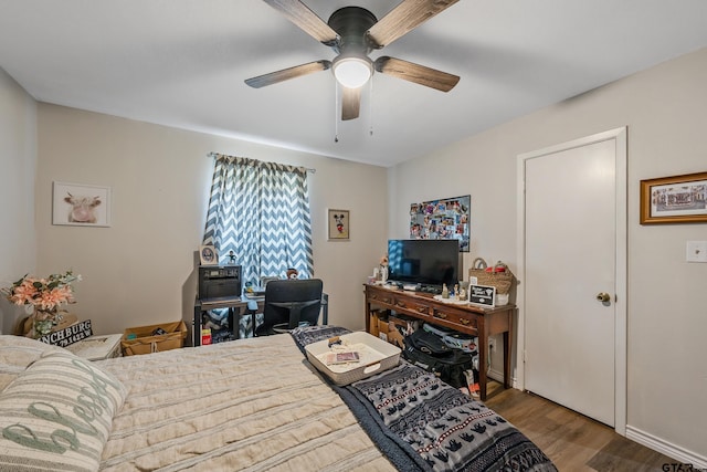 169 Phil Dr, Hawkins, TX 75765 - bedroom with ceiling fan and hardwood / wood-style flooring