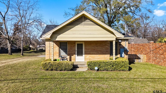 bungalow with a front lawn