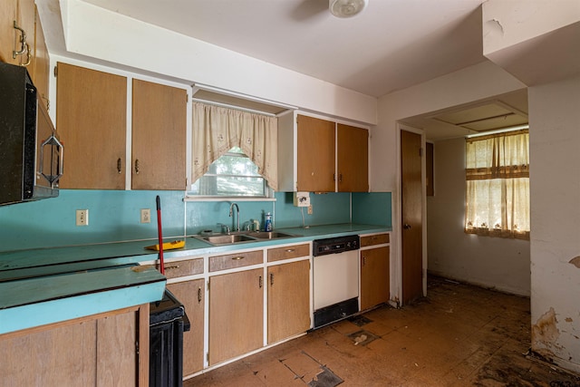 3131 Greg Ln, Tyler, TX 75701 - kitchen featuring dishwasher and light countertops