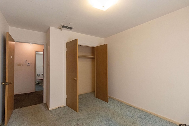 3131 Greg Ln, Tyler, TX 75701 - unfurnished bedroom featuring a closet and light carpet