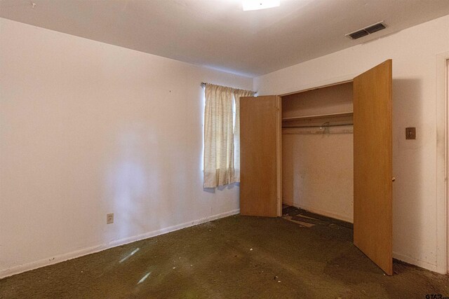 3131 Greg Ln, Tyler, TX 75701 - unfurnished bedroom featuring a closet and concrete flooring