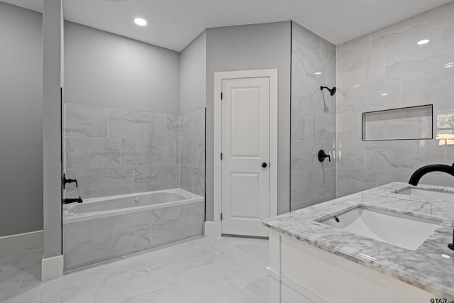 21019 C R 116, Tyler, TX 75703 - bathroom featuring marble finish floors, a garden tub, double vanity, baseboards, and recessed lighting