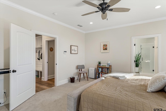 bedroom featuring ceiling fan, carpet floors, and crown molding