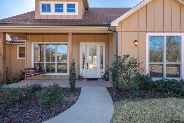 property entrance featuring a porch