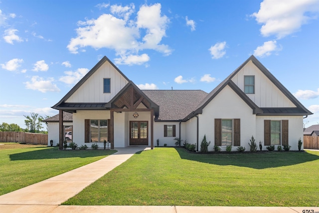 12237 Harlon St, Flint, TX 75762 - modern farmhouse with board and batten siding, french doors, a front lawn, and fence
