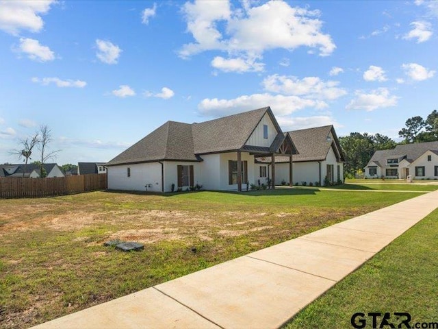 12237 Harlon St, Flint, TX 75762 - view of front of property with fence and a front yard