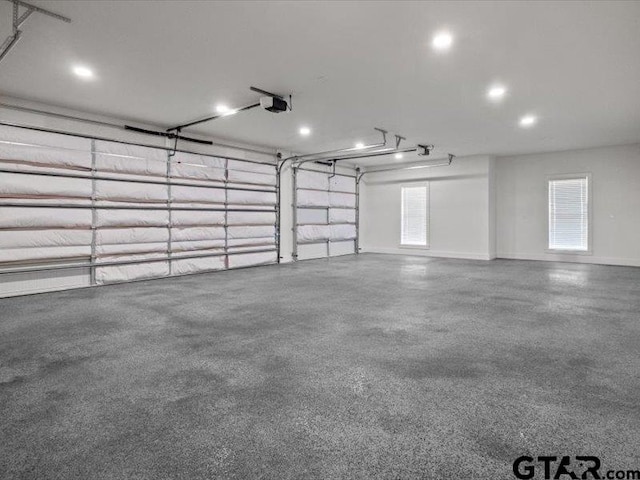 12237 Harlon St, Flint, TX 75762 - garage with recessed lighting, baseboards, and a garage door opener