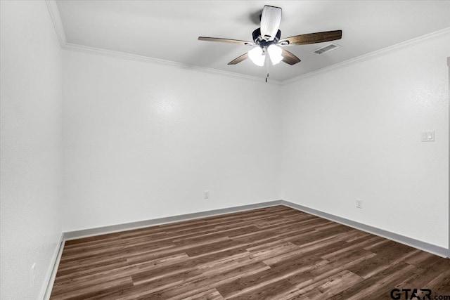 unfurnished room with crown molding, ceiling fan, and dark hardwood / wood-style flooring