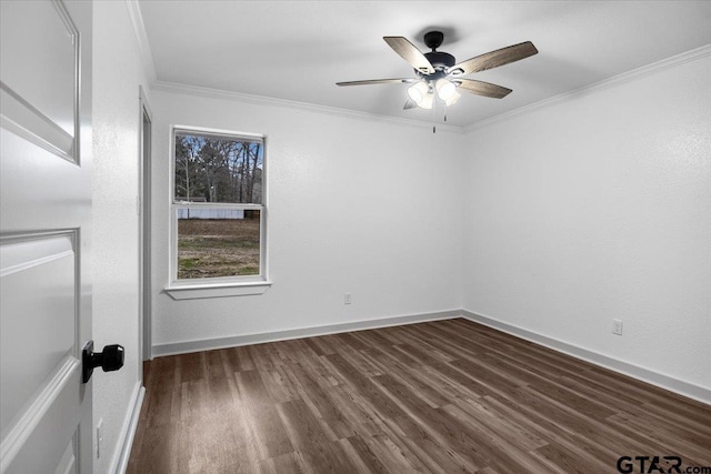 unfurnished room featuring dark wood-type flooring, ceiling fan, and ornamental molding