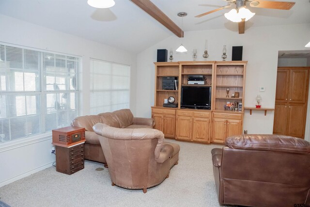 carpeted living room with lofted ceiling with beams and ceiling fan