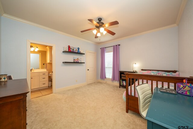 carpeted bedroom with crown molding, ceiling fan, and ensuite bath