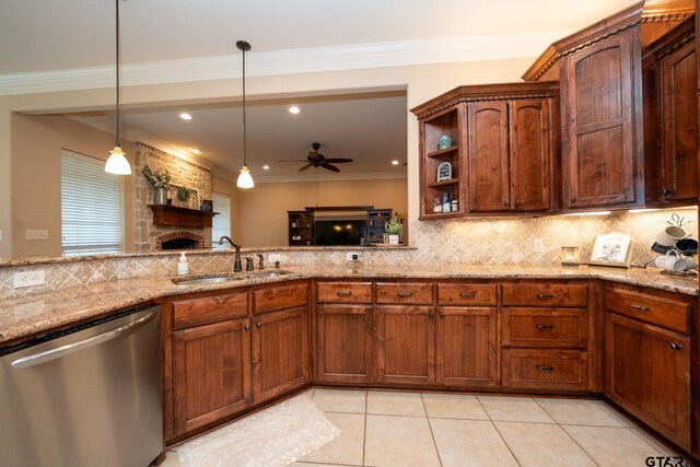 kitchen featuring sink, ornamental molding, stainless steel dishwasher, ceiling fan, and decorative light fixtures