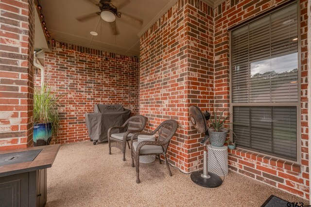 view of patio / terrace featuring ceiling fan